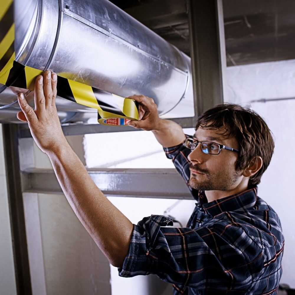 Varoitusteippi Tesa 33 m x 50 mm Kelta-musta