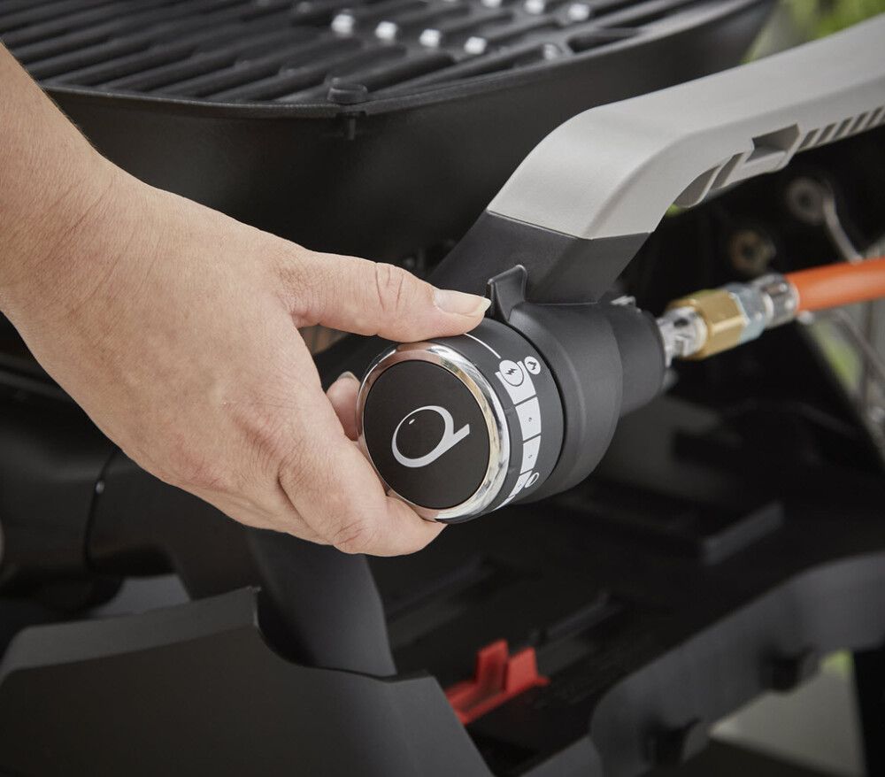 KAASUGRILLI WEBER Q1200N SIVUPÖYDILLÄ